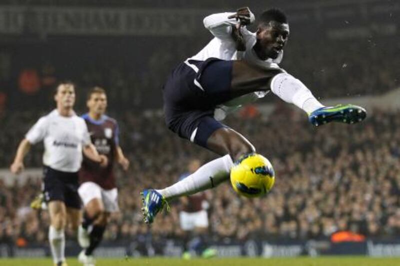 Tottenham Hotspur's Togolese player Emmanuel Adebayor attempts a shot  during an English Premier League football match between Tottenham Hotspur and Aston Villa at White Hart Lane in London, England, on November 21, 2011. AFP PHOTO/IAN KINGTON

RESTRICTED TO EDITORIAL USE. No use with unauthorised audio, video, data, fixture lists, club/league logos or ‚Äúlive‚Äù services. Online in-match use limited to 45 images, no video emulation. No use in betting, games or single club/league/player publications.
 *** Local Caption ***  318619-01-08.jpg