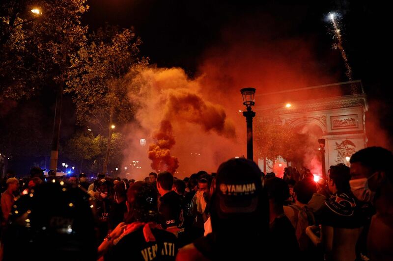 Paris Saint-Germain fans celebrate in Paris. AFP