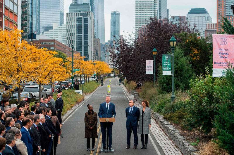 New York City Mayor Bill de Blasio (C) speaks as his wife  Chirlane McCray (R), Argentina’s Presidnet Mauricio Macri (2nd-R)  and Frist Lady Juliana Awada listen during a ceremony on a bike path in New York on November 6, 2017, to pay tribute to the October 31 terror attack victims.  

Sayfullo Saipov, the Uzbek immigrant behind New York's worst attack in 16 years, killed eight people including five Argentinians, plowing down a bike path with a rental truck. .  / AFP PHOTO / Jewel SAMAD