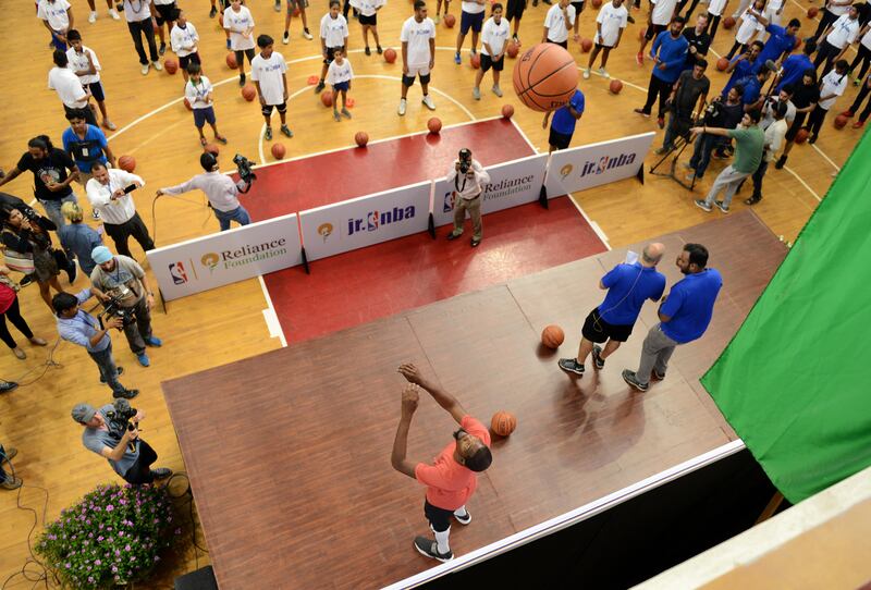 Golden State Warriors star Kevin Durant conducts a coaching a clinic in Delhi. Money Sharma / AFP