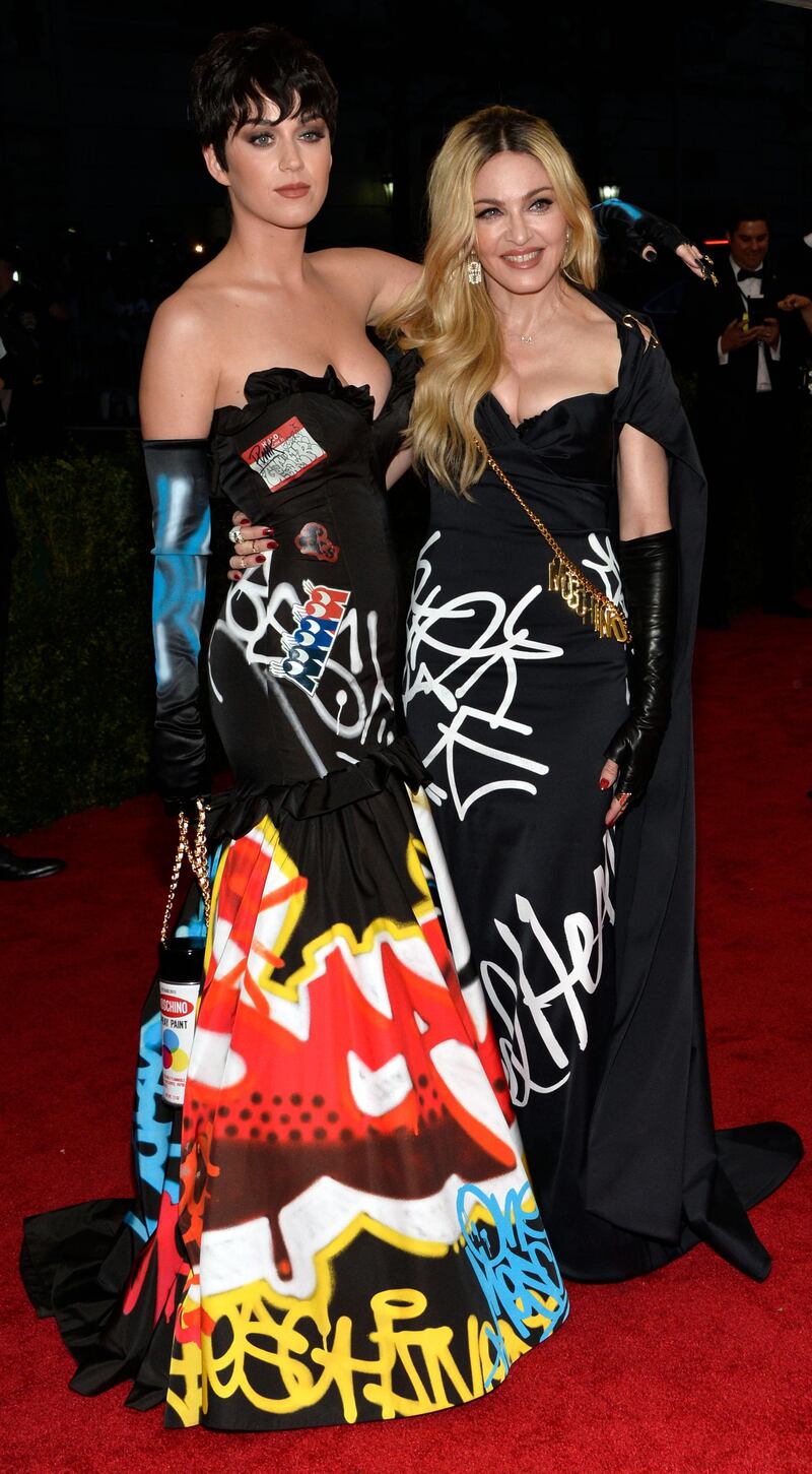 epa04733433 Katy Perry and Madonna (R) arrive for the 2015 Anna Wintour Costume Center Gala held at the New York Metropolitan Museum of Art in New York, New York, USA, 04 May 2015. The Costume Institute will present the exhibition 'China: Through the Looking Glass' at The Metropolitan Museum of Art from 07 May to 16 August 2015.  EPA/JUSTIN LANE