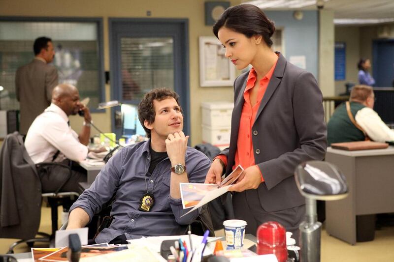 Andy Samberg, left, and Melissa Fumero in Brooklyn Nine Nine. AP Photo / Fox, Beth Dubber.