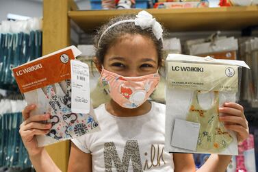 Abu Dhabi, United Arab Emirates, August 23, 2020. Patricia-6 with her newly purchased face masks at the LC Waikiki shop in Al Wahda Mall, Abu Dhabi. Victor Besa /The National Section: NA Reporter: