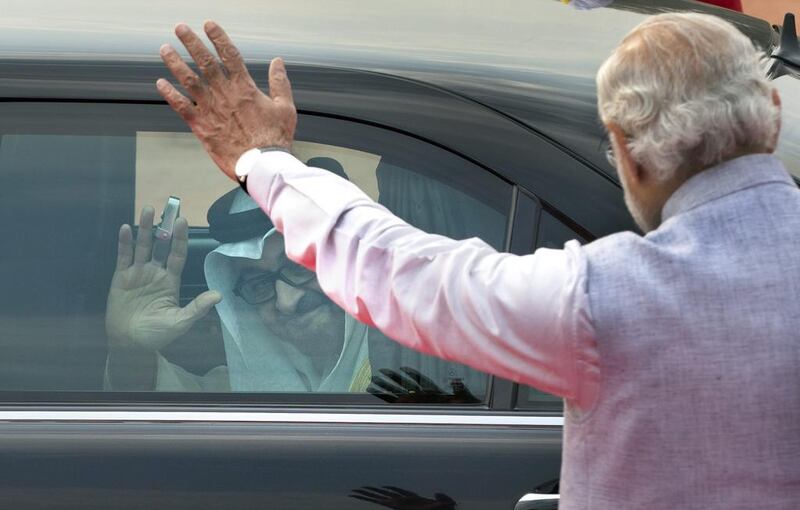 Indian prime minister Narendra Modi waves to Abu Dhabi Crown Prince Sheikh Mohammed bin Zayed as he leaves after his ceremonial reception at the Indian presidential palace. Manish Swarup / AP Photo