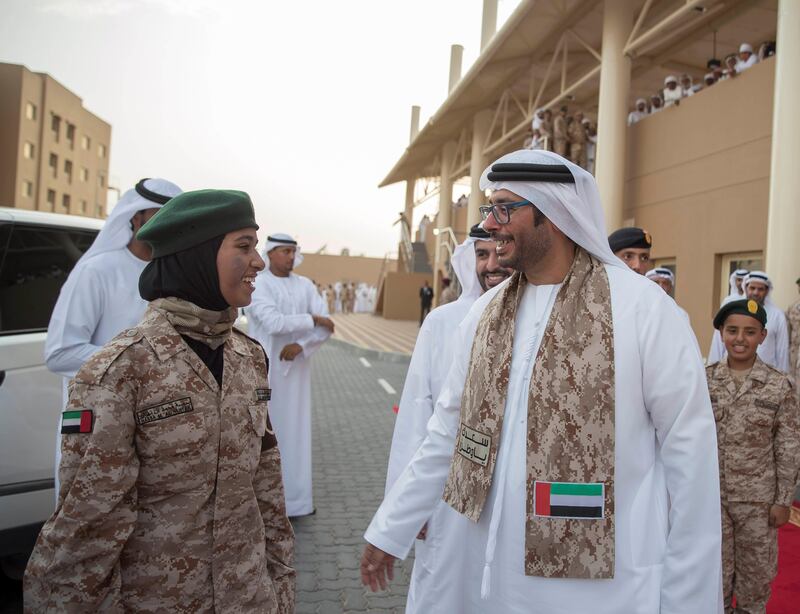 Sheikh Ahmed bin Hamdan (R) speaks with Sheikha Hassa bint Mohammed bin Zayed (L), during the volunteer cadet summer course graduation ceremony at Sieh Al Hama military camp. Mohammed Al Hammadi / Crown Prince Court - Abu Dhabi 