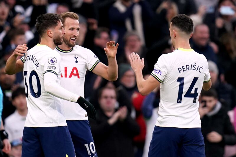 Tottenham Hotspur's Harry Kane, centre, celebrates scoring against Manchester City. It was Kane's 200th Premier League goal. PA