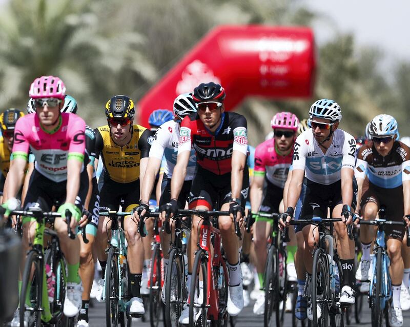 Madinat Zayed, Abu Dhabi, UAE, February 21, 2018.  First stage of the Abu Dhabi Tour 2018, Al Fahim Stage.  Cyclists passing KM Zero mark. (yellow jersey) Rui Costa
Victor Besa / The National
Sports
Reporter:  Amith Passela