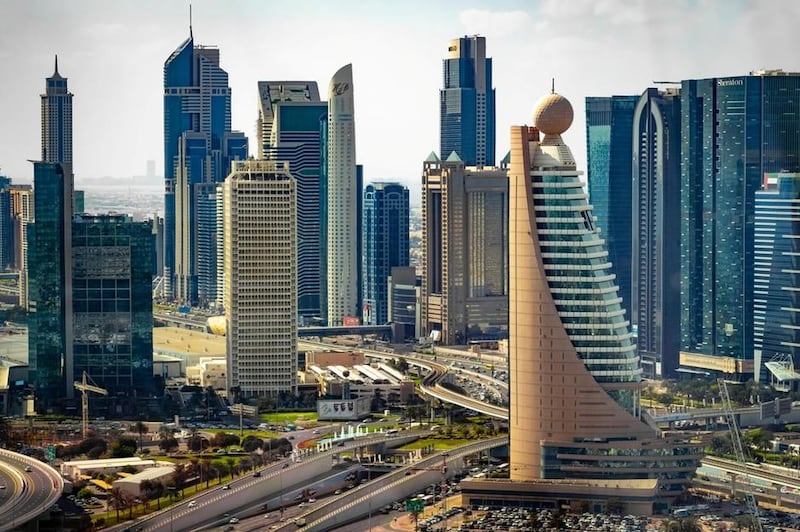 Dubai World Trade Centre (the grey, rectangular building to the middle left) was opened by Queen Elizabeth II in 1979. The tallest building in the UAE until 1999, it appears on the Dh100 banknote. Alamy