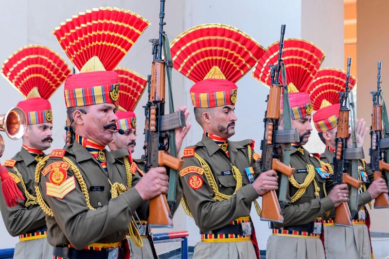 Members of India's Border Security Force perform during a flag ceremony to celebrate Republic Day at the India-Pakistan Wagah border post, 35km from Amritsar. AFP