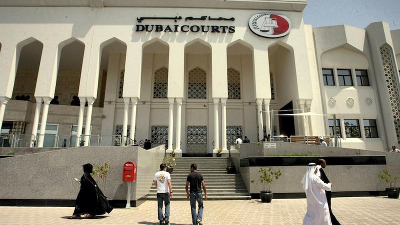 A British woman is in court for spitting on a police officer in Dubai. Courtesy: AFP 