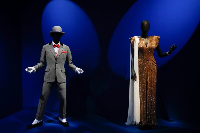 A costume worn by Sammy Davis Jr.  in the film adaptation of George Gershwin's 1935 Broadway opera 'Porgy and Bess' (L) and a costume worn by Lena Horne in the film 'Stormy Weather' (R) are displayed during a media preview for the exhibition titled 'Regeneration: Black Cinema, 1898-1971' at the Academy Museum of Motion Pictures in Los Angeles, California, USA, 17 August 2022.   EPA / CAROLINE BREHMAN