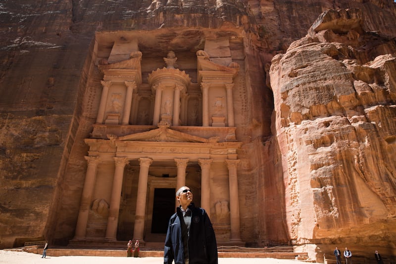 Mr Obama views the area near the Treasury during a walking tour of the ancient city of Petra in Jordan, March 23, 2013. Photo: The National Archives