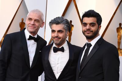 Soren Steen Jespersen, from left, Feras Fayyad, and Kareem Abeed arrive at the Oscars on Sunday, March 4, 2018, at the Dolby Theatre in Los Angeles. (Photo by Jordan Strauss/Invision/AP)
