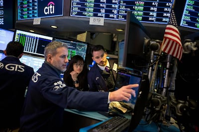 Traders work on the floor of the New York Stock Exchange (NYSE) in New York, U.S., on Monday, Feb. 12, 2018. U.S. stocks advanced as Treasury yields erased their climb, with financial markets looking to stabilize after the worst week in two years for American equities. Photographer: Michael Nagle/Bloomberg