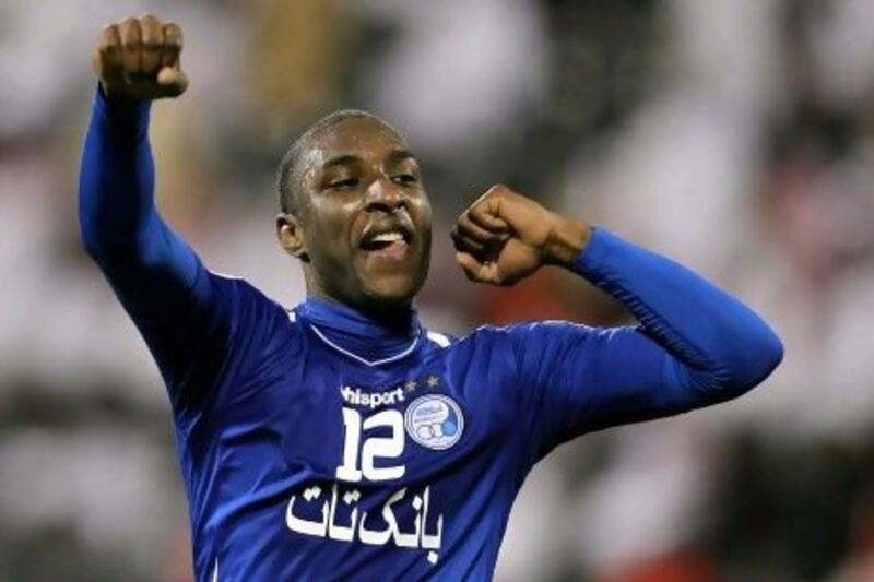 Jlloyd Samuel celebrates Esteghlal's Asian Champions League win over Al Rayyan earlier this month. The defender and his side are in the same Group A as Pro League champions Al Jazira. AFP