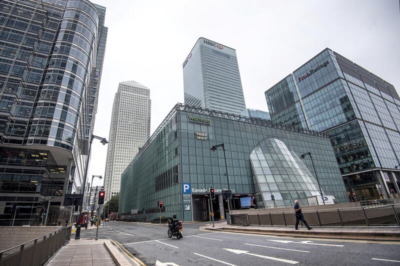 PA via Reuters
A lone commuter on an empty street in Canary Wharf, London, as workers are being encouraged to return to their offices, with a Government PR blitz commencing this week reminding people about the efforts taken to make workplaces "Covid-secure".No Use UK. No Use Ireland. No Use Belgium. No Use France. No Use Germany. No Use Japan. No Use China. No Use Norway. No Use Sweden. No Use Denmark. No Use Holland