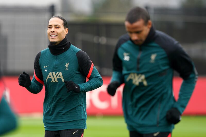 Virgil van Dijk, left, and Joel Matip during training. PA