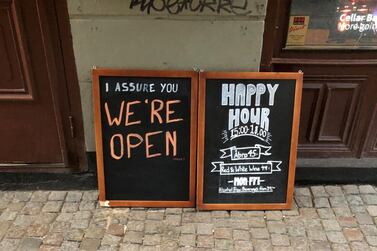 A sign tells people that the bar is open during the coronavirus outbreak in Stockholm, Sweden in March. Reuters