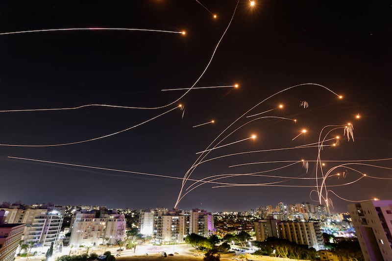 The Iron Dome anti-missile system intercepts rockets launched from the Gaza Strip, as seen from the city of Ashkelon. Reuters