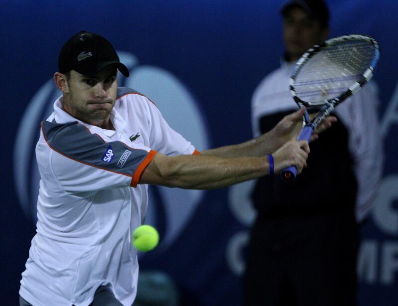 DUBAI,UNITED ARAB EMIRATES - March 4 : Andy Roddick of USA return the ball against Juan Carlos Ferrero during the second round of the Dubai Duty Mens Open Tennis Championship at Dubai Tennis Stadium in Garhoud, Deira. [ Photo by Paulo Vecina / The Nation ] *** Local Caption *** PV Roddick 4.JPG