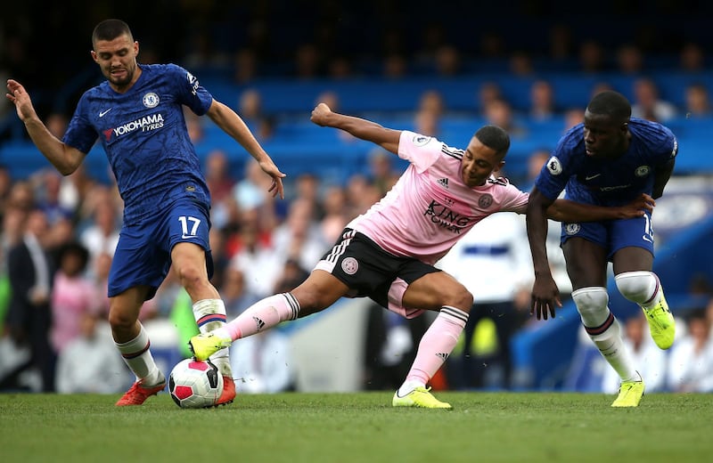 Leicester's Youri Tielemans battles for the ball with Chelsea's Mateo Kovacic. PA