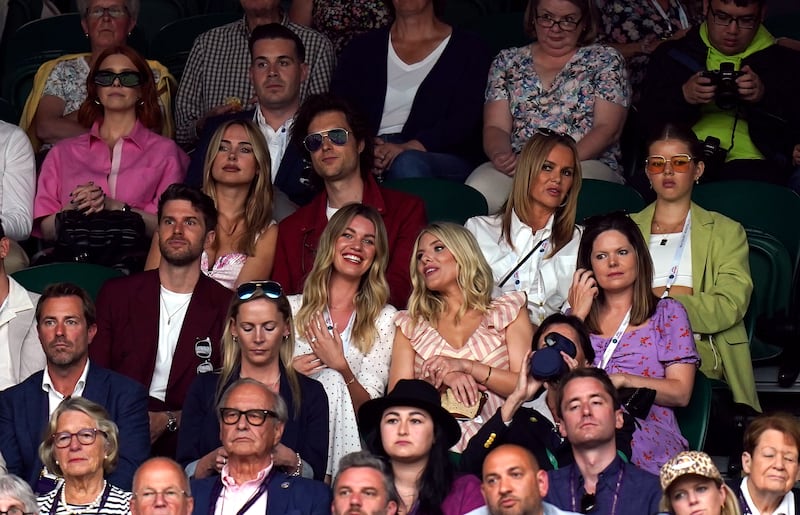 Kimberley Garner, second row from top, left, was seated behind Joel Dommett, centre row, left. Next to him is his wife, Hannah Cooper, and Mollie King. Amanda Holden, second row from top, middle right, chats with her daughter Lexi on day one of Wimbledon 2022. PA