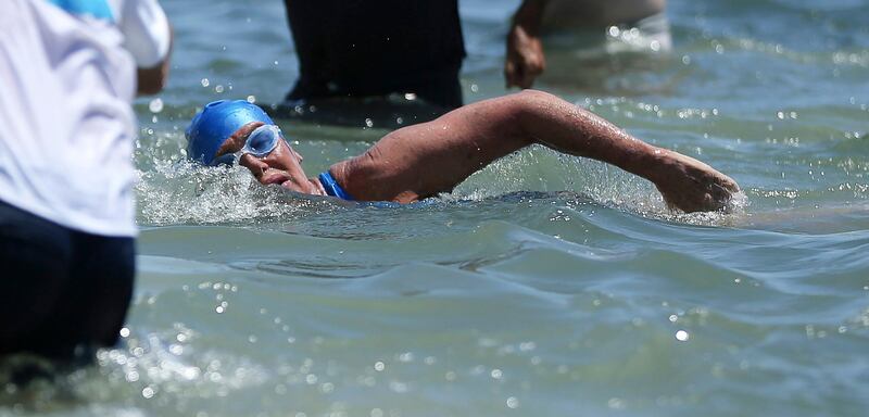 Long distance swimmer Diana Nyad swims towards shore in Key West, Fla., Monday, Sept. 2, 2013, after swimming from Cuba. Nyad became the first person to swim from Cuba to Florida without the help of a shark cage. She arrived at the beach just before 2 p.m. EDT, about 53 hours after she began her swim in Havana on Saturday.  (AP Photo/J Pat Carter) *** Local Caption ***  Cuba Swimming To Florida.JPEG-0ca6e.jpg