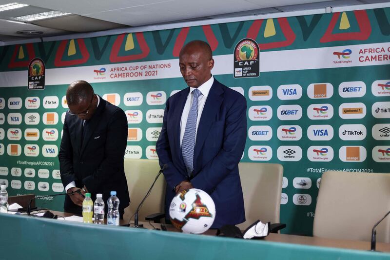 Confederation of African Football President Patrice Motesepe observes a minute of silence before a press conference on January 25 at Ahmadou Ahidjo stadium in Yaounde, in which eight people were killed and many more injured. AFP