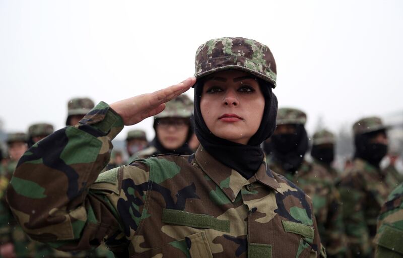 Newly graduated Afghan female National Army soldiers attend their graduation ceremony after a three month training program at the Afghan Military Academy in Kabul, Afghanistan. AP Photo