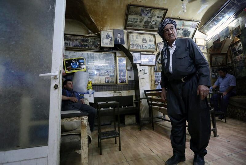 But after buying the cafe in 1967, he was free to hang as many photos as the walls could hold. Safin Hamed / AFP  