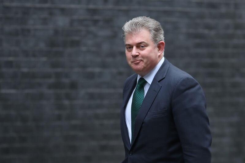 Britain's Minister without Portfolio and Conservative Party Chairman Brandon Lewis arrives at 10 Downing Street for the weekly cabinet meeting in London on March 19, 2019.  / AFP / Daniel LEAL-OLIVAS
