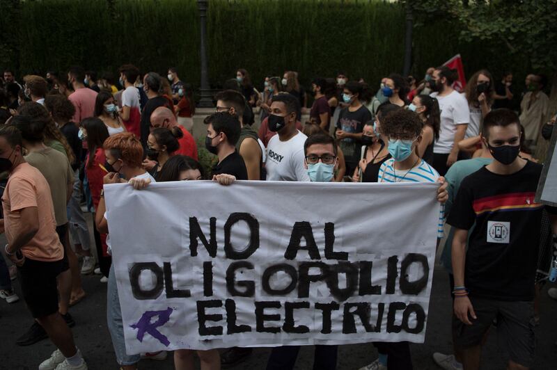 Protesters at a demonstration against the increase in household electricity bills in Granada, Spain. Gas and electric prices are surging in Europe with consumers finding higher bills in their mailboxes. AFP