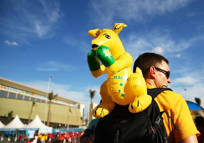 An Australia fan enjoys the atmosphere before their opener against Chile. Cameron Spencer / Getty Images