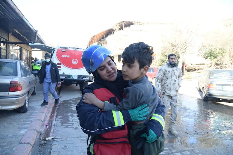 The boy rescued along with his two sisters and mother