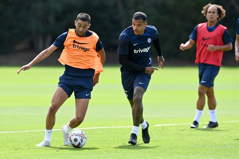 Hakim Ziyech and Kenedy of Chelsea during a training session at Cobham.