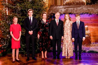BRUSSELS, BELGIUM - DECEMBER 17: Princess ElÃ©onore of Belgium, Prince Gabriel, Queen Mathilde, King Philippe of Belgium, Princess Elisabeth and Prince Emmanuel pose in front of the Christmas Crib prior to attending the Christmas Concert by the Scala Choir at the Royal Palace on December 17, 2020 in Brussels, Belgium. The throne room is decorated with a Christmas â€œveil of origamisâ€ conceived by designer Charles Kaisin. (Photo by FrÃ©dÃ©ric Sierakowski - Royal Belgium Pool/Getty Images) (Photo by FrÃ©dÃ©ric Sierakowski - Royal Belgium Pool/Getty Images)