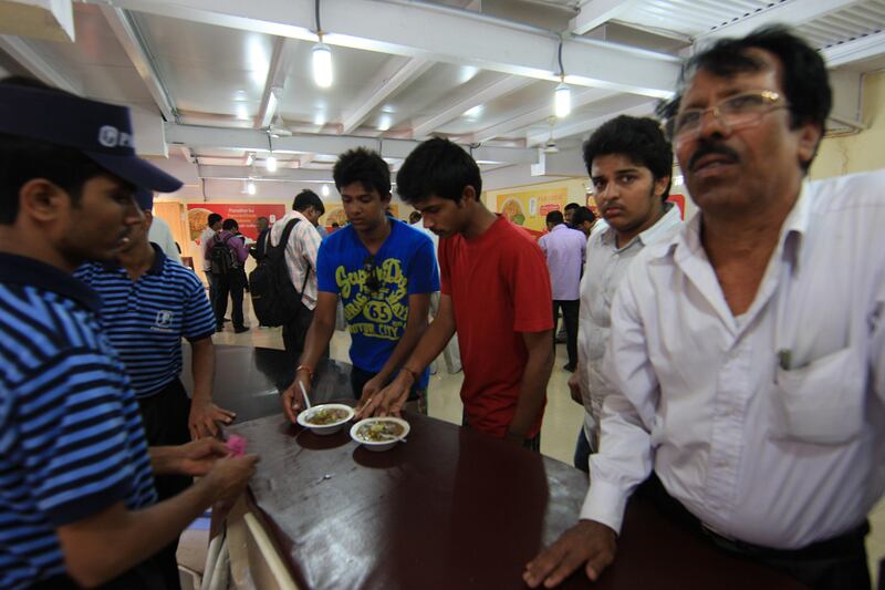 HYDERABAD - INDIA - 02AUG 2012 -  Customers buying Haleem at Paradise Food Court in Secunderabad, haleem, a dish of meat and lentils that it makes particularly during Ramadan in Andhra Pradesh State in India. Ravindranath K / The National (to go with Samanth story on Ramadan)