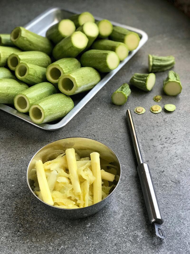 Courgettes are cored, with the pulp set aside to be used later. Courtesy Maie Jeneidi / Table Tales