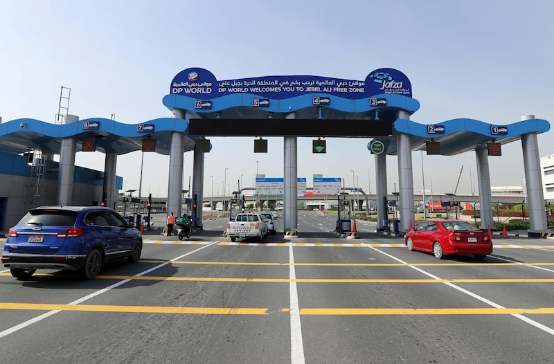 FILE PHOTO: Cars approach the main entrance of DP World at Jebel Ali Port in Dubai, United Arab Emirates, December 27, 2018.  REUTERS/Hamad I Mohammed/File Photo