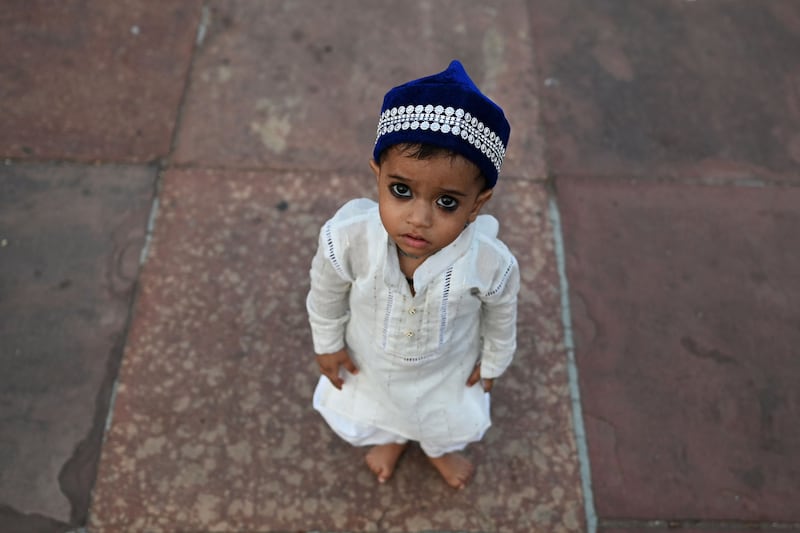 A young worshipper at Jama Masjid in the old quarters of New Delhi, India. AFP