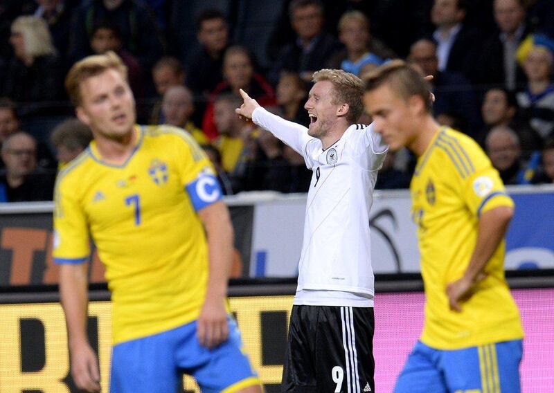 Sweden 3-5 Germany. Andre Schurrle, center, notched a second-half hat-trick as the Germans fought back from a 2-0 deficit. They finished with 28 points from 10 matches to top Group C, while Sweden still have a place in a play-off after finishing second. Jonathan Nackstrand / AFP