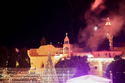 Fireworks light the sky to mark the lighting of a Christmas tree in Bethlehem. AFP