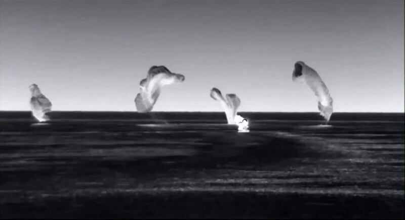 A screen grab from the SpaceX live webcast shows the Crew-2 SpaceX Dragon capsule 'Endeavour' parachuting to splashdown off the coast of Pensacola, Florida. AFP