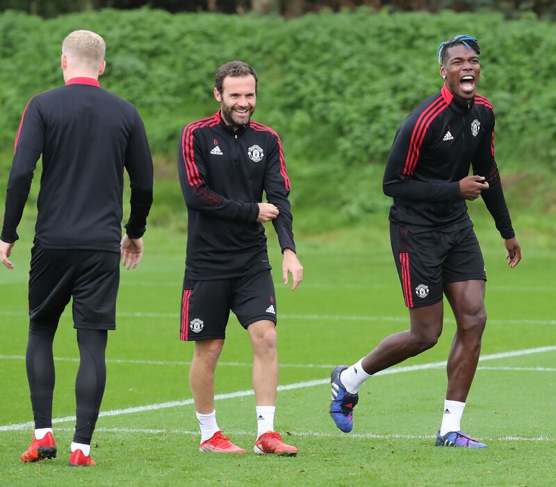 Juan Mata and Paul Pogba of Manchester United tune up for the trip to Leicester.