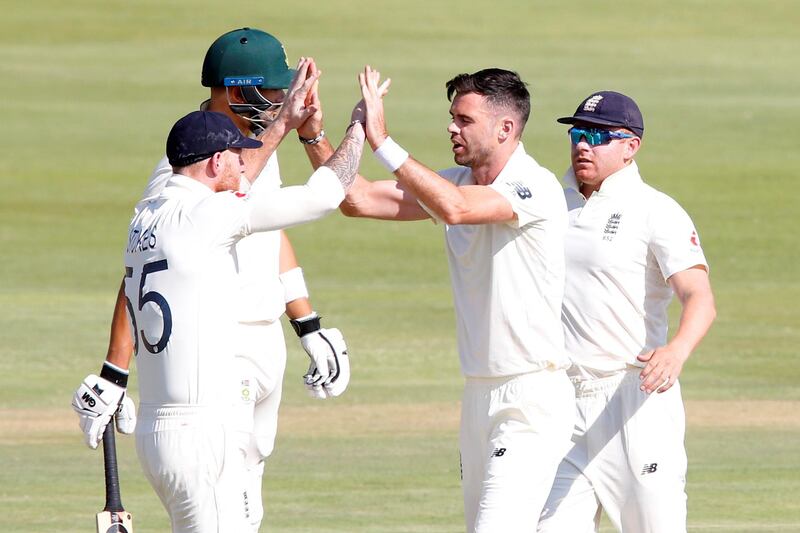 Cricket - South Africa v England - First Test - Supersport Park, Centurion, South Africa - December 27, 2019   England's James Anderson celebrates the wicket of South Africa's Aiden Markram with Ben Stokes   REUTERS/Rogan Ward