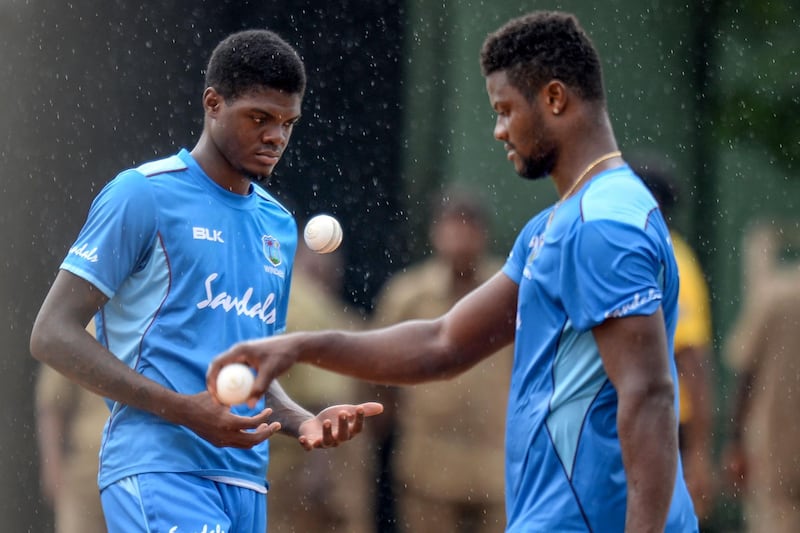 West Indies' Romario Shepherd, right, and Alzarri Joseph during a training session in Chennai. AFP