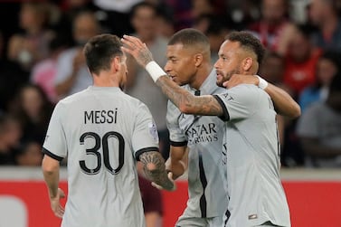 From left, PSG's Lionel Messi, PSG's Kylian Mbappe, and PSG's Neymar react after scoring a goal during the French League One soccer match between Lille and Paris Saint Germain at the Pierre Mauroy stadium in Villeneuve d'Ascq, northern France, Sunday, Aug.  21, 2022.  (AP Photo / Michel Spingler)
