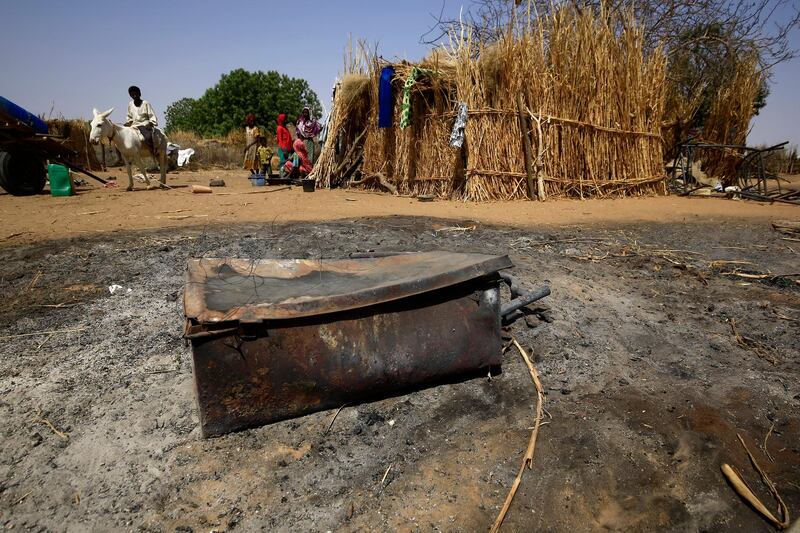 A picture shows the aftermath of violence in the Sudanese village of al-Twail Saadoun, 85 kilometres south of Nyala town, the capital of South Darfur, on February 2, 2021. - The combined death toll from recent violence in Sudan's restive Darfur region has risen above 200, after medics revised the toll from one set of clashes upwards by over 50. (Photo by ASHRAF SHAZLY / AFP)