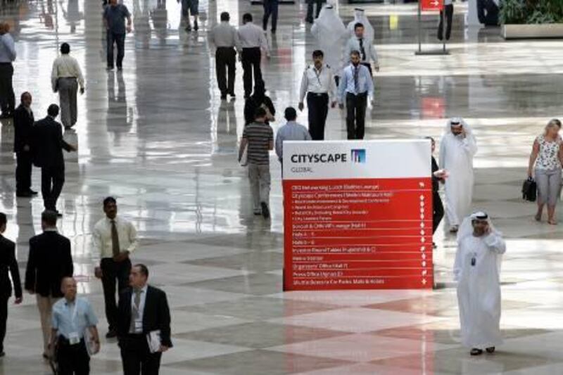 
DUBAI, UNITED ARAB EMIRATES Ð Oct 4: Visitors are coming before the opening of  Cityscape Global 2010 at Dubai International Convention and Exhibition Centre in Dubai. (Pawan Singh / The National) For Business.
