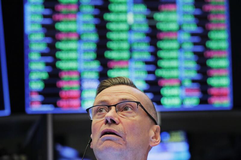A trader works on the floor of the New York Stock Exchange (NYSE) shortly after the opening bell in New York, U.S., March 26, 2019. REUTERS/Lucas Jackson